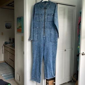 Acid washed stretch denim coveralls.